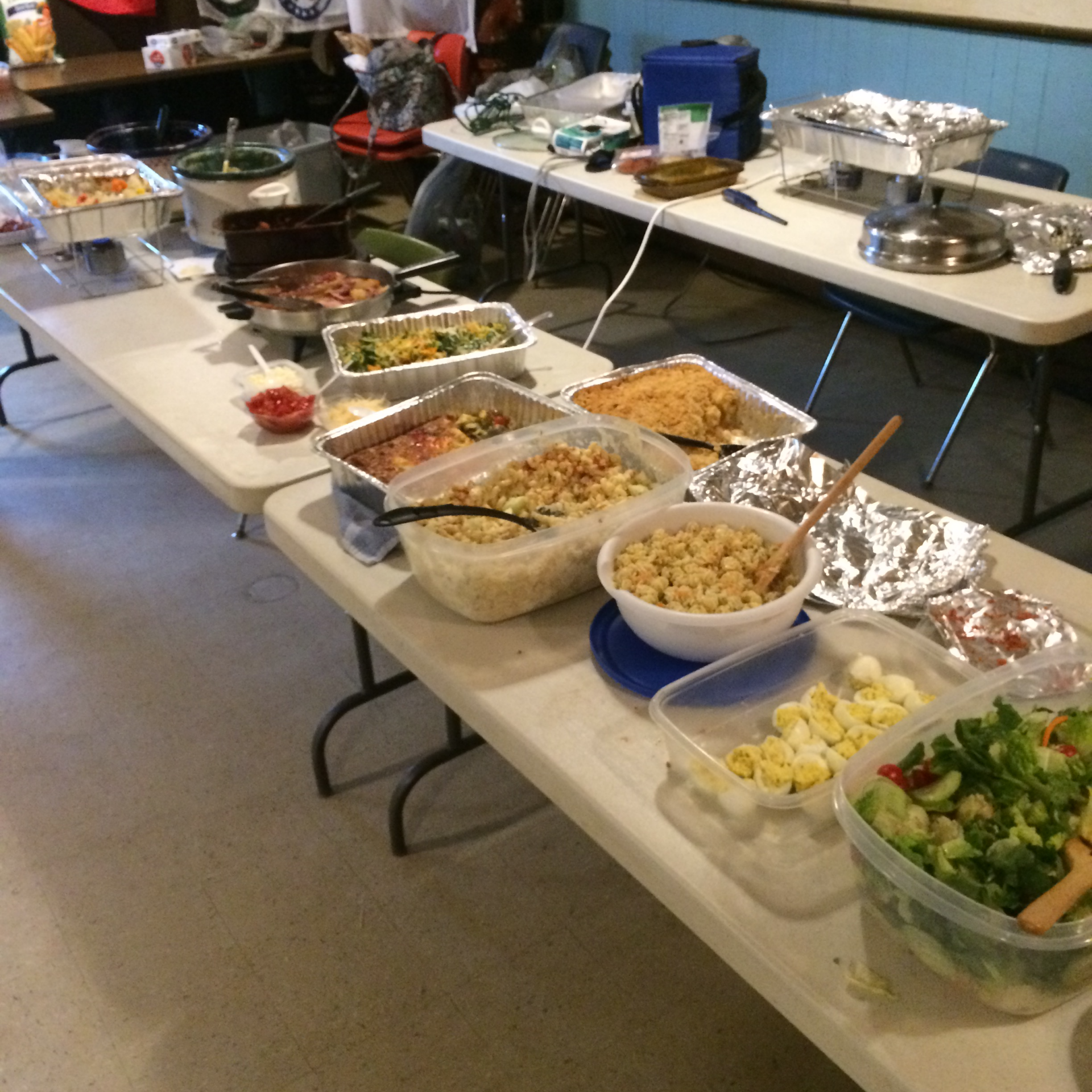 tables with assortments of hot food